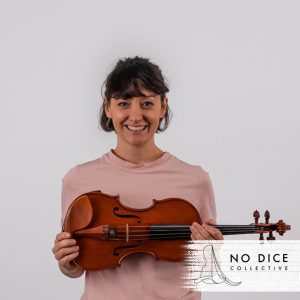 Gemma Bass of Vonnegut Collective holding her violin